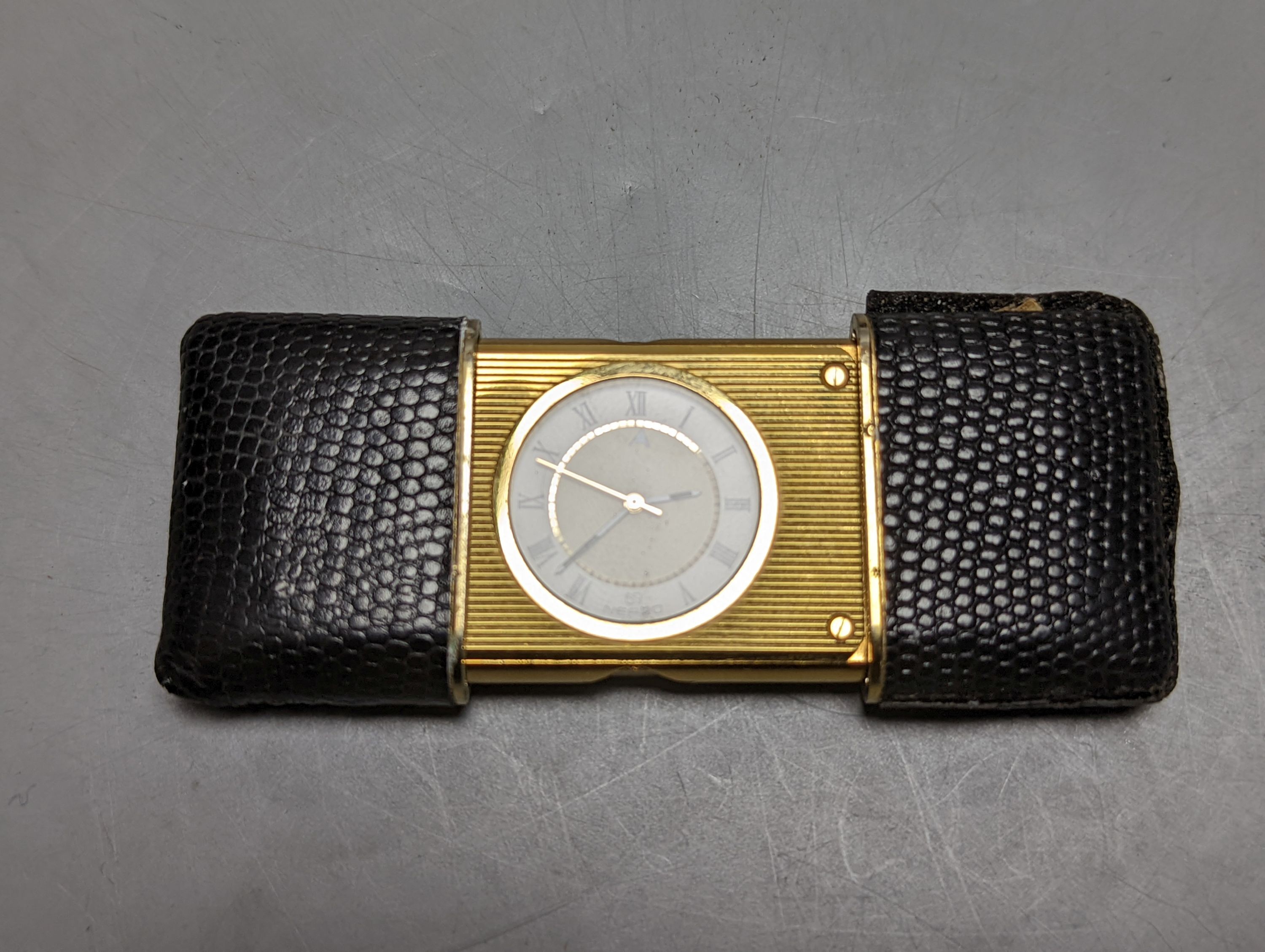 Dunhill and other wallets, novelty pistol lighter, etc.